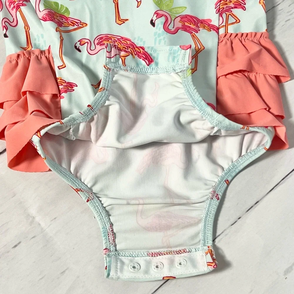 Mud Pie Baby Girls Flamingo One-Piece Rash Guard Swimsuit with Ruffle Butt